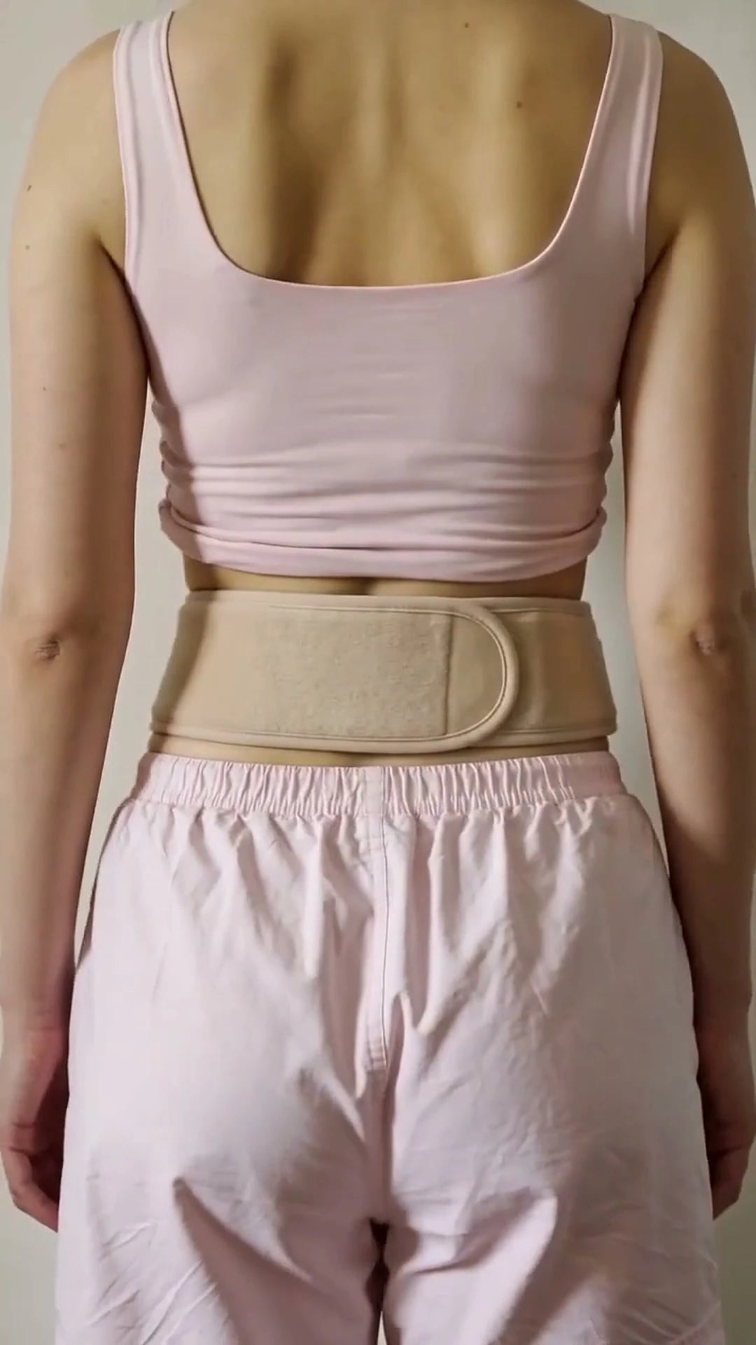 AI model, illustrative heat wrap, back view.